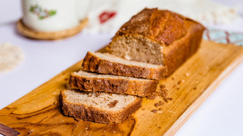 Slices of Amish friendship bread on a wooden chopping board