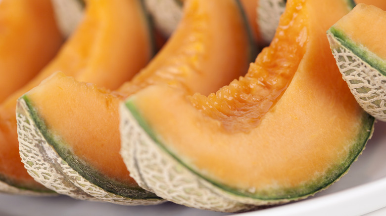 slices of cantaloupe on plate