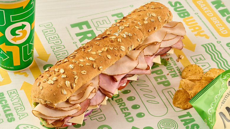 A close-up of a subway sandwich made with subway's honey oat bread