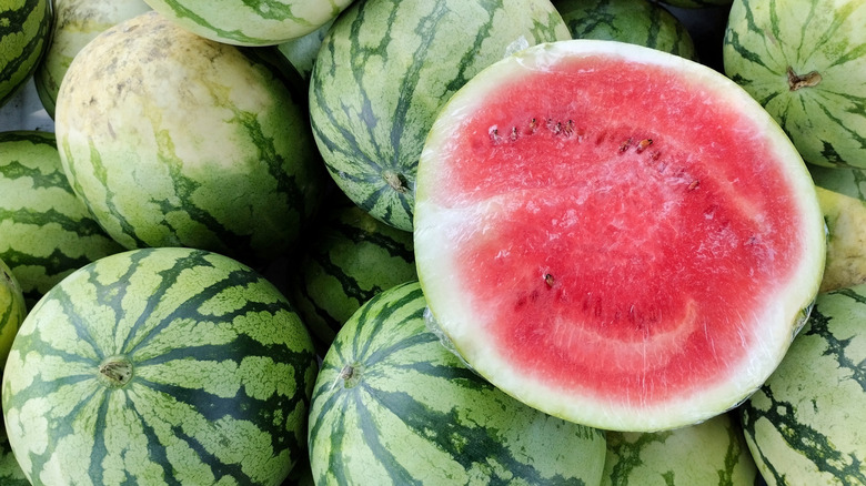 cut watermelon over uncut melons