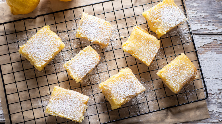 Lemon bars on a cooling rack.