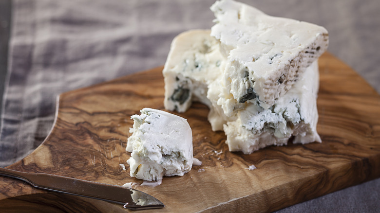 blue cheese on cutting board