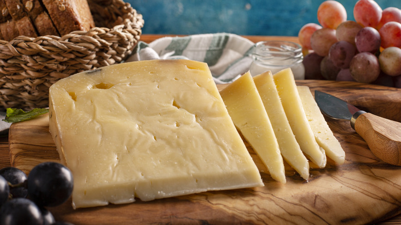 gruyere cheese on cutting board