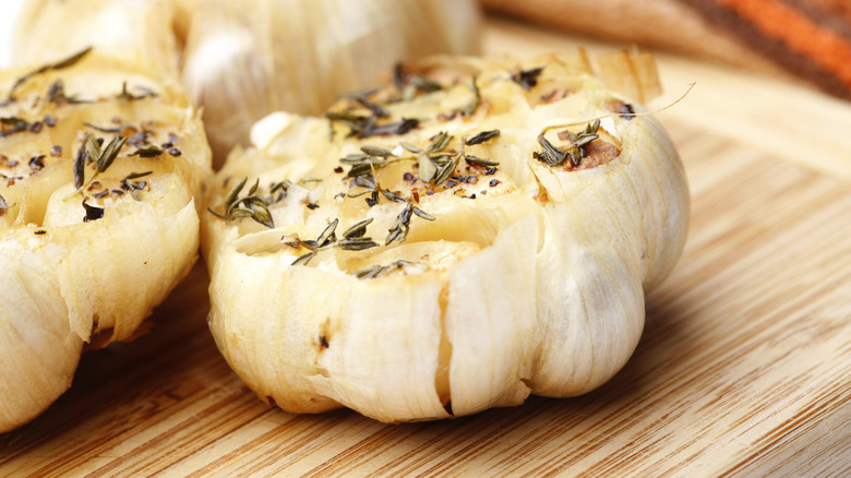 roasted garlic on cutting board