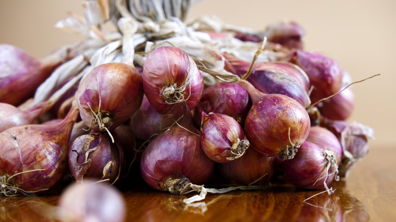 shallots on wooden table