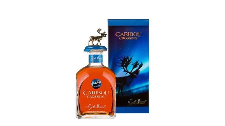 A box and bottle of Caribou Crossing whiskey