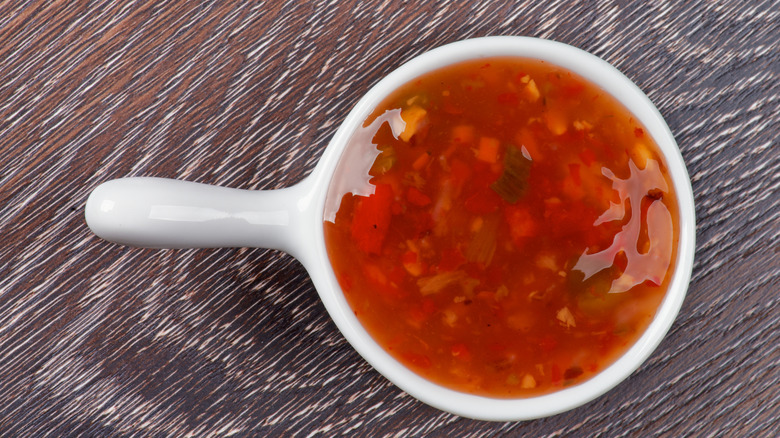 a dish of sweet and sour sauce