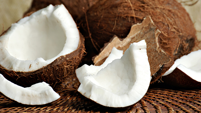 close up of split coconuts