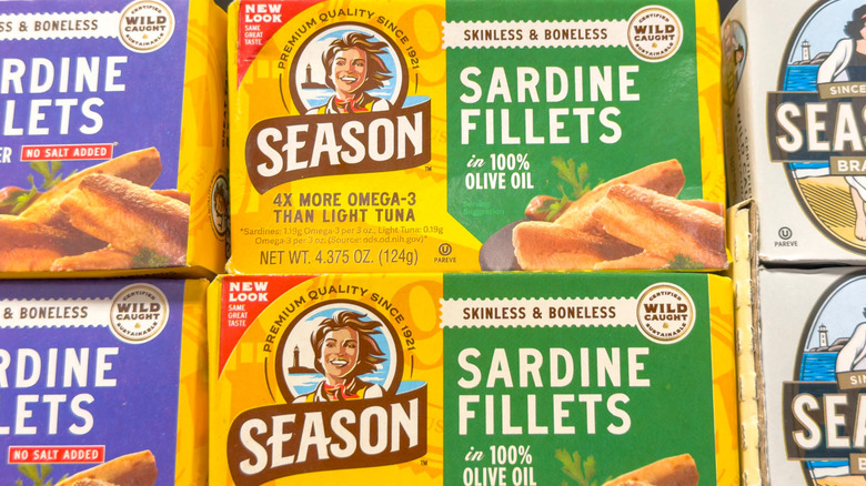 season sardine filets on shelf at store