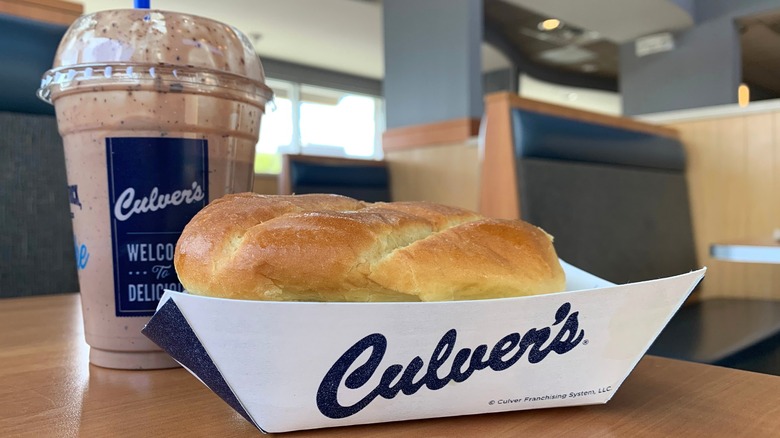 Culver's sandwich and milkshake on table