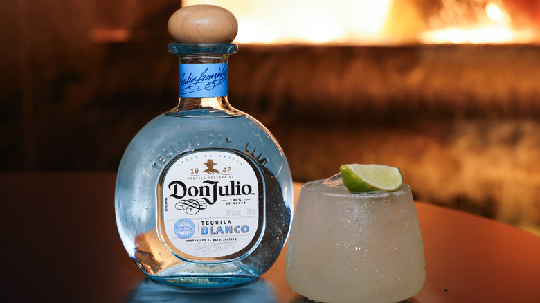Bottle of Don Julio with a margarita