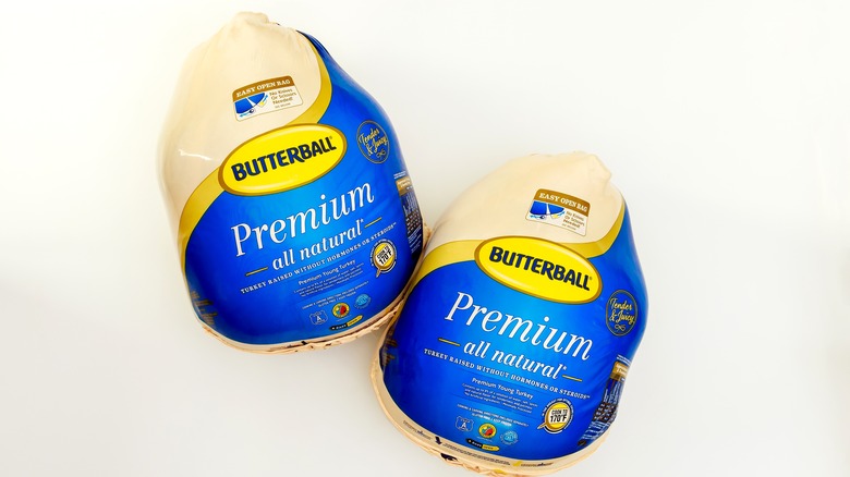 two butterball turkeys in packaging side by side on a white background