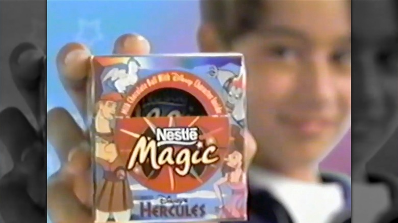 Kid holding Nestlé Magic ball