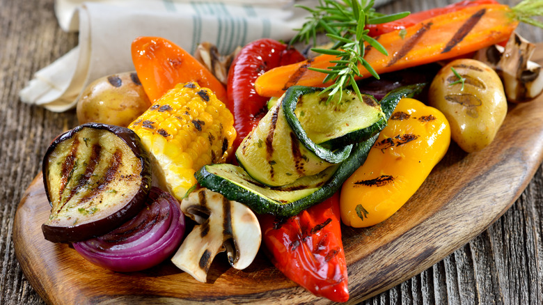Grilled vegetables on wood platter