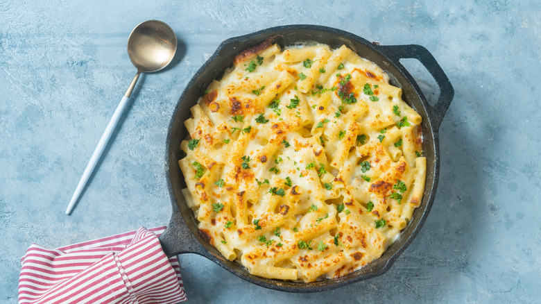 Baked mac and cheese in a hot skillet