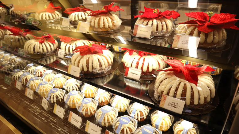 Closeup up pastries in case inside a Nothing Bundt Cakes location