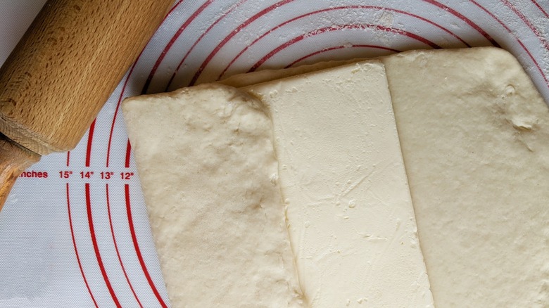 Dough with rectangle of butter tucked inside