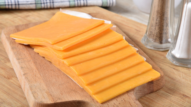 Sliced cheese on a platter