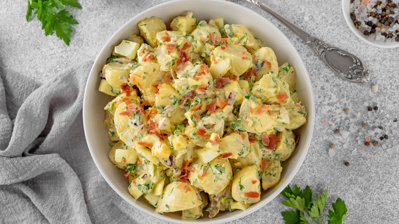 Potato salad with herbs and bacon