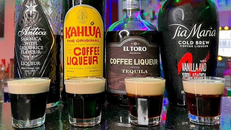 Four baby Guinness shots with various liqueurs