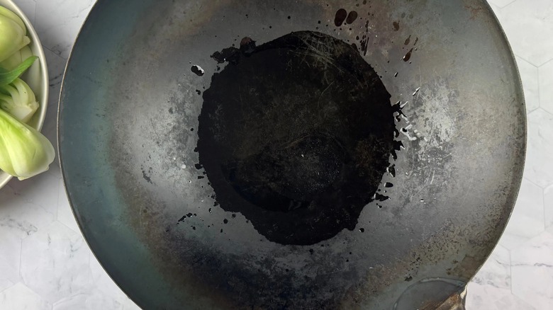 oil in a black wok