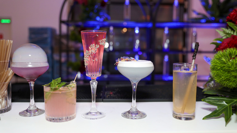 A number of different cocktails on a table