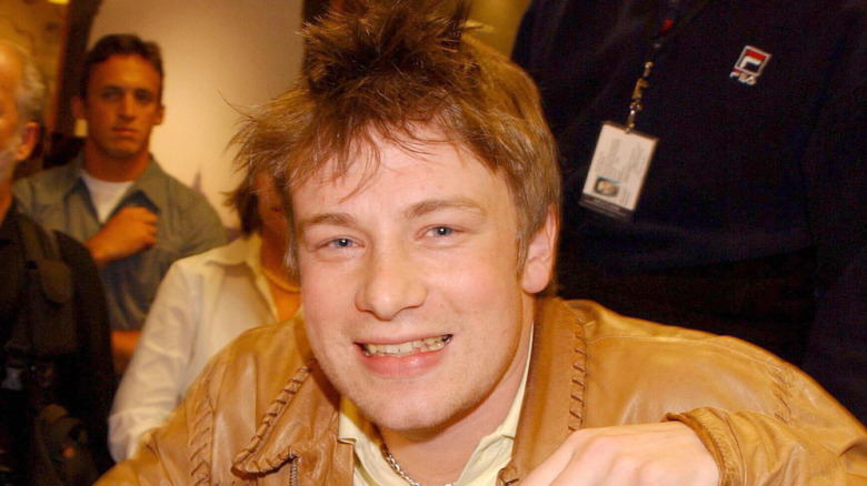 A close-up of a smiling Jamie Oliver