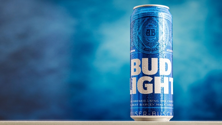 Isolated Bud Light beer can with blue background