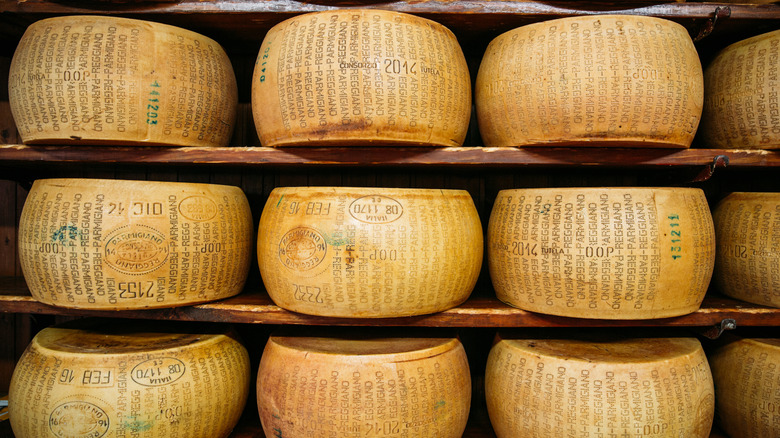 Shelves of Parmigiano-Reggiano wheels