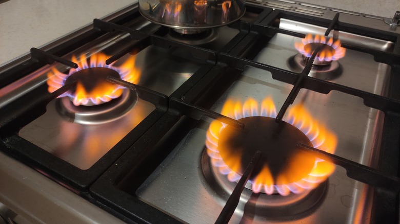 Dangerous orange flame on a gas stove