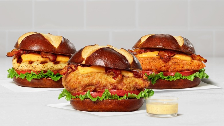 Three variations of Chick-fil-A's Pretzel Cheddar Club Sandwich