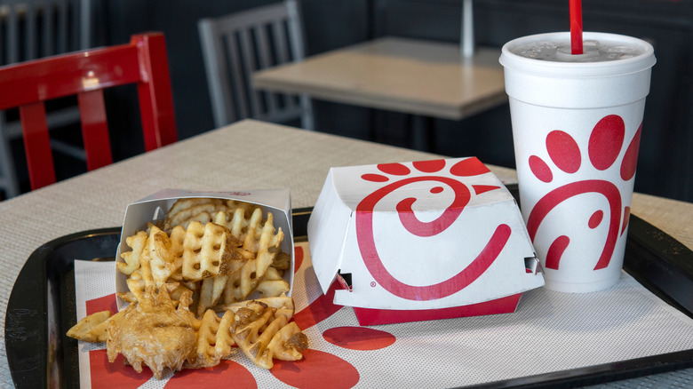 A Chick-fil-A meal with waffle fries sits on a tray