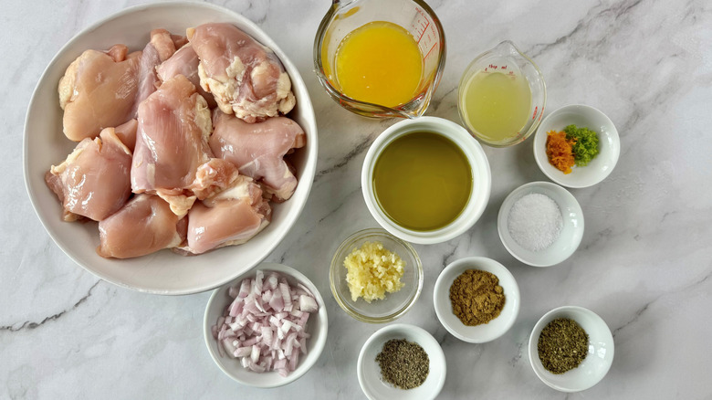 mojo chicken ingredients on marbled counter