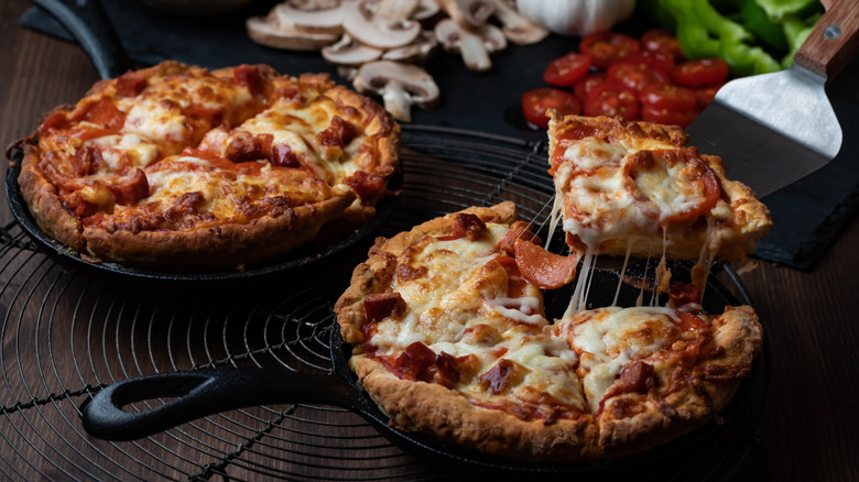 Deep dish pan pizzas in cast iron skillets