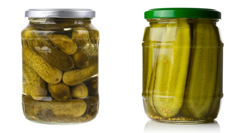 Glass jar of cornichons/glass jar of large pickles.