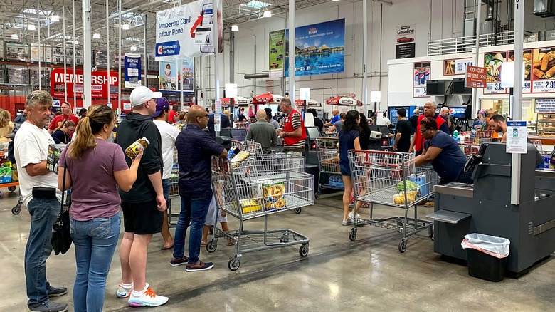 Costco shoppers waiting in checkout line