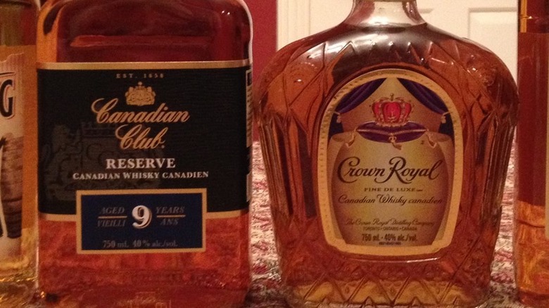 Bottles of Canadian Club and Crown Royal whisky