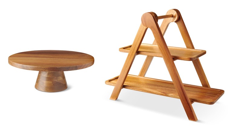 A wooden circular cake stand and wooden triangular cake stand.