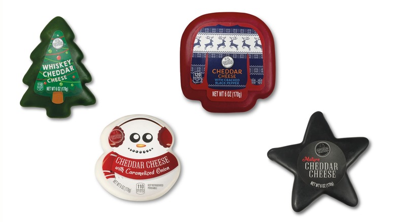 Four holiday flavored and shaped cheeses with different flavors.