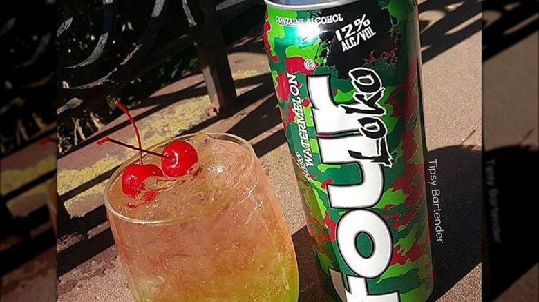 Four Loko can next to cocktail