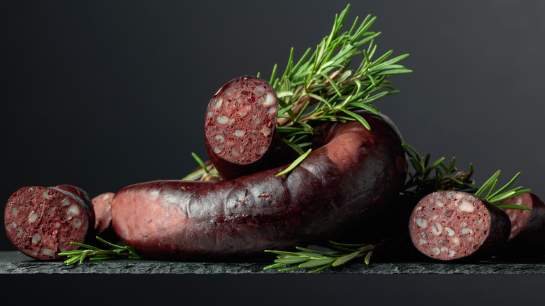 Black pudding sliced with rosemary