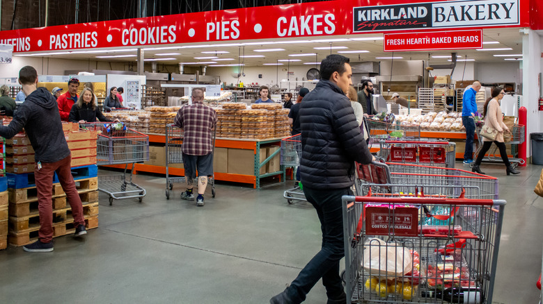 people in costco bakery section