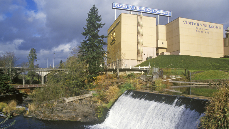 Olympia Brewing Company building with water