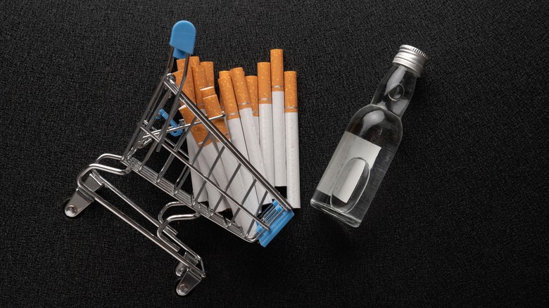 Mini-shopping cart with cigarettes and alcohol