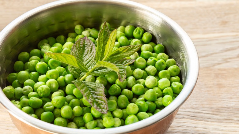 Peas in bowl with pickled mint