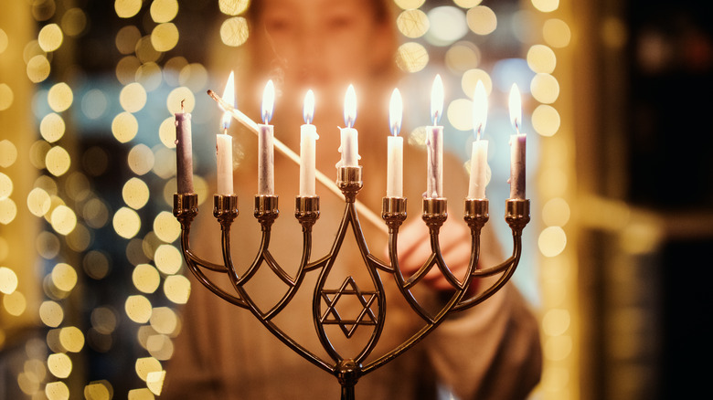 Lighting a menorah
