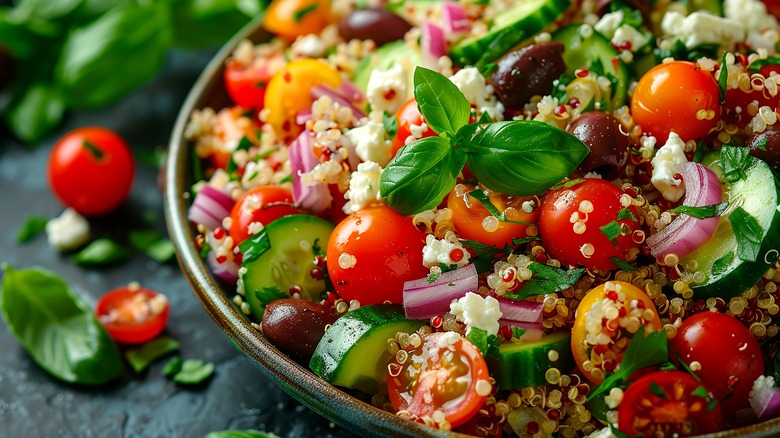 Salad with vegetables and quinoa in bowl