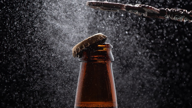 Beer bottle being opened