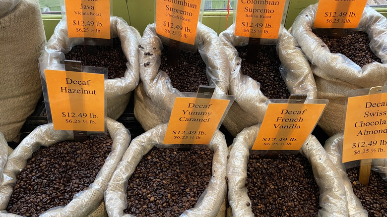 Sacks of different flavors of coffee beans