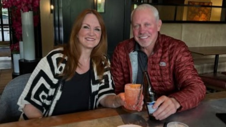 Ladd and Ree Drummond drinking at a bar